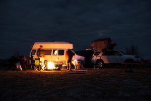 car camping with a dog at night time